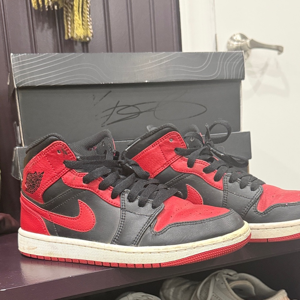 Jordan 1 Mid Red and Black high-top Sneakers